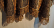 Load image into Gallery viewer, Closeup of Fringe on Bottom of Alpaca Brown Gold Ruana Poncho with Hood, Gold Detail and Fringe