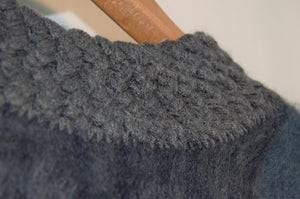 Close Up of Back View of Neck Embroidery of Alpaca Silver Blue Ruana Poncho with Embroidered Edge